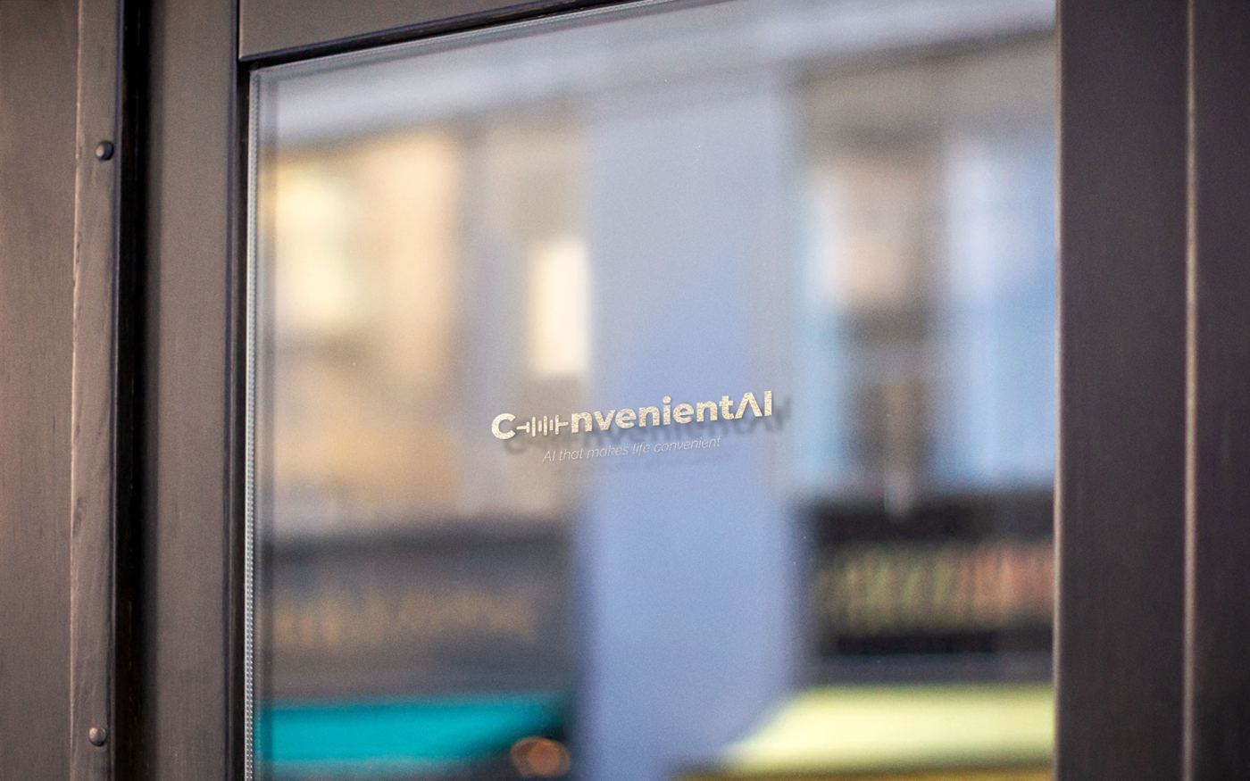 ConvenientAI logo on a frosted glass office door